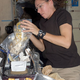 Magnus cooking in the space station, with the aid of some duct tape and plastic bags to fight against the problems of gravity (Image: NASA)